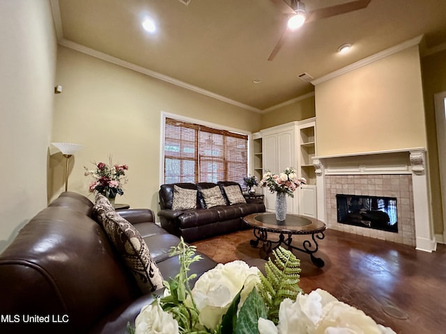 109 Brisage Dr, Madison, MS 39110 - living room with concrete floors, ornamental molding, a tiled fireplace, and a ceiling fan