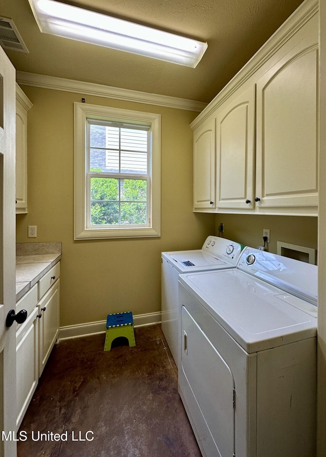 109 Brisage Dr, Madison, MS 39110 - washroom with crown molding, cabinet space, visible vents, baseboards, and washing machine and dryer