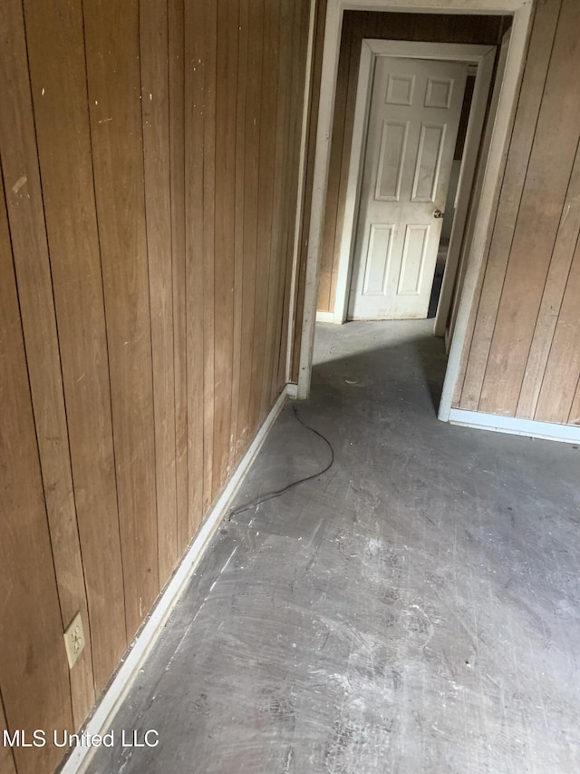 hallway with wooden walls