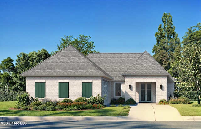 10893 Lily Ln, Gulfport, MS 39503 - view of front of house featuring french doors, brick siding, a front lawn, and a shingled roof