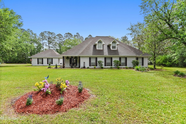 view of front of home with a front lawn