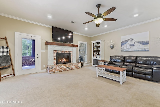 carpeted living room with a ceiling fan, crown molding, visible vents, and recessed lighting