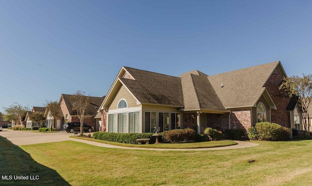 view of property exterior featuring a yard