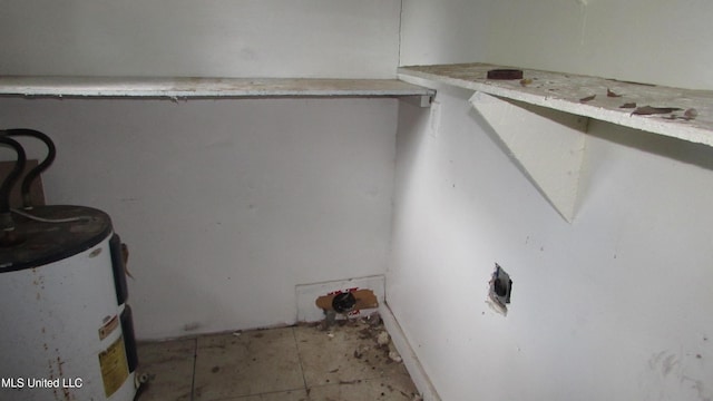 3001 Hewes Ave, Gulfport, MS 39507 - clothes washing area featuring water heater