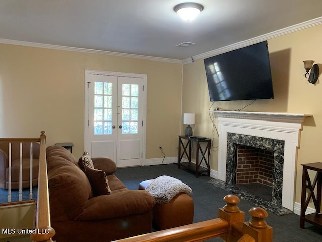 living room featuring dark carpet, a premium fireplace, crown molding, and french doors