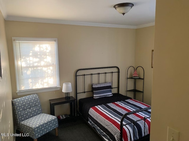 bedroom with carpet and ornamental molding