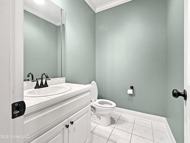 bathroom featuring crown molding, marble look tiles, vanity, baseboards, and toilet