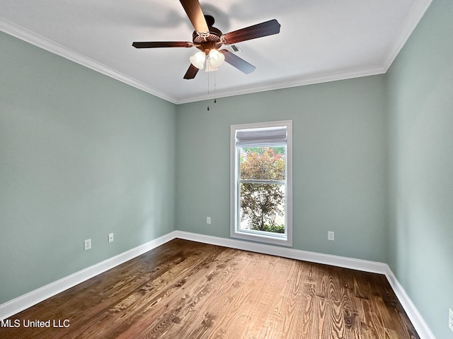 empty room featuring wood finished floors, baseboards, a ceiling fan, and ornamental molding