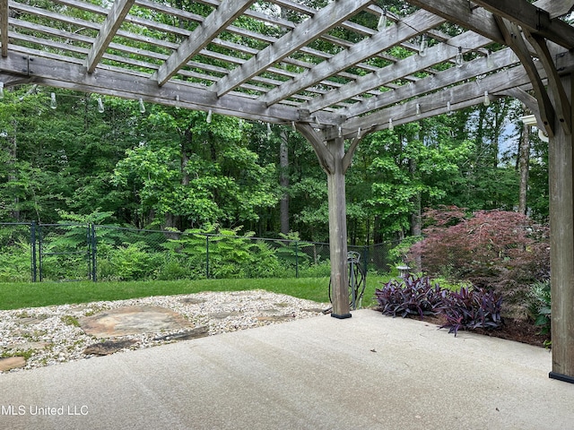 view of patio / terrace featuring fence and a pergola