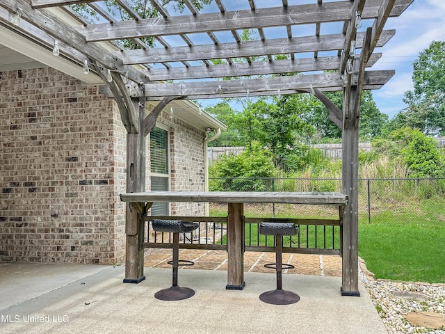 view of patio / terrace featuring a pergola