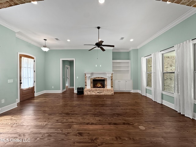 unfurnished living room with ceiling fan, crown molding, baseboards, dark wood finished floors, and recessed lighting