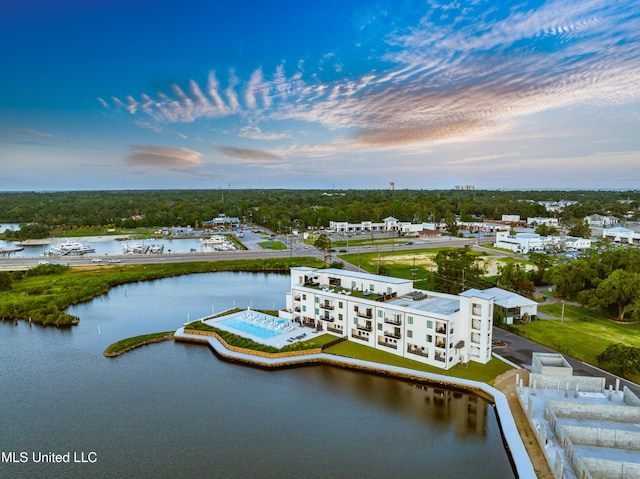 1302 Magnolia St Unit A101, Gulfport, MS 39507 - aerial view at dusk of a water view and view of scattered trees