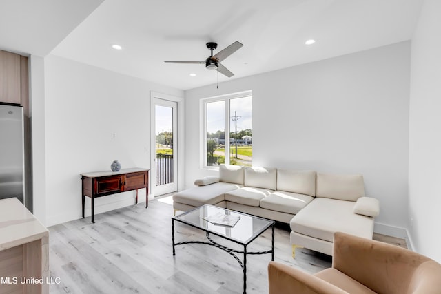 1302 Magnolia St Unit A101, Gulfport, MS 39507 - living room with ceiling fan, light wood finished floors, and recessed lighting