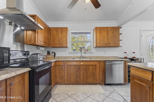 kitchen featuring ceiling fan, crown molding, wall chimney range hood, sink, and black appliances