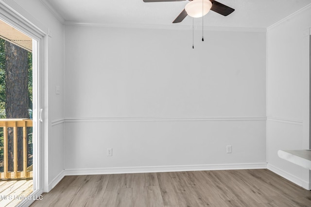 empty room with light wood-style floors, baseboards, crown molding, and a ceiling fan