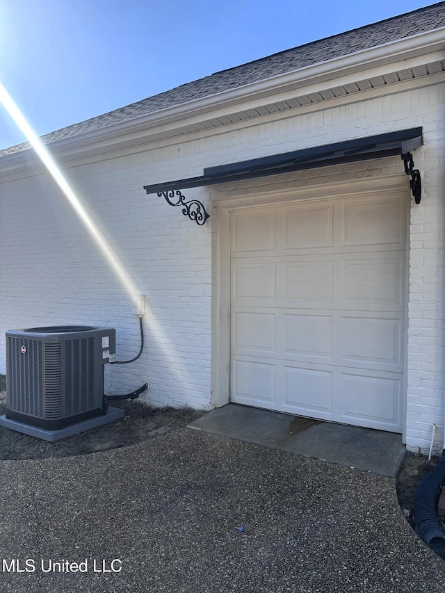 garage featuring central air condition unit