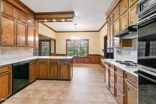 kitchen with black appliances, kitchen peninsula, pendant lighting, decorative backsplash, and an inviting chandelier