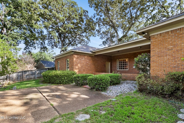 view of home's exterior with a patio