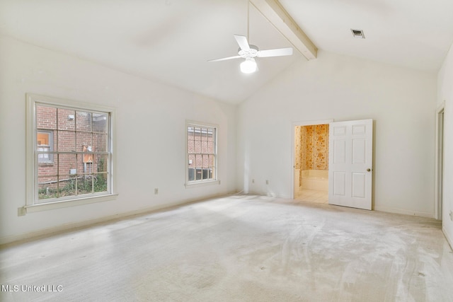 carpeted spare room featuring beamed ceiling, high vaulted ceiling, and ceiling fan