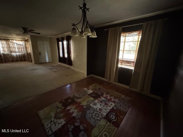 dining space with a ceiling fan