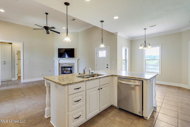 218 Greenfield Ridge Dr, Brandon, MS 39042 - kitchen featuring dishwasher, a sink, light tile patterned floors, plenty of natural light, and ornamental molding
