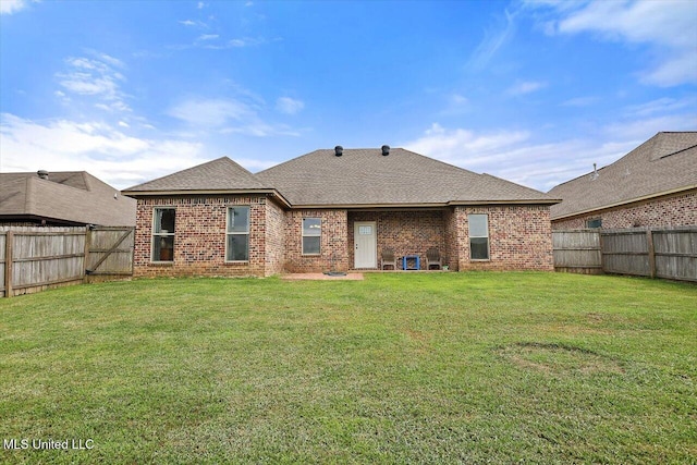 218 Greenfield Ridge Dr, Brandon, MS 39042 - rear view of property featuring brick siding and roof with shingles