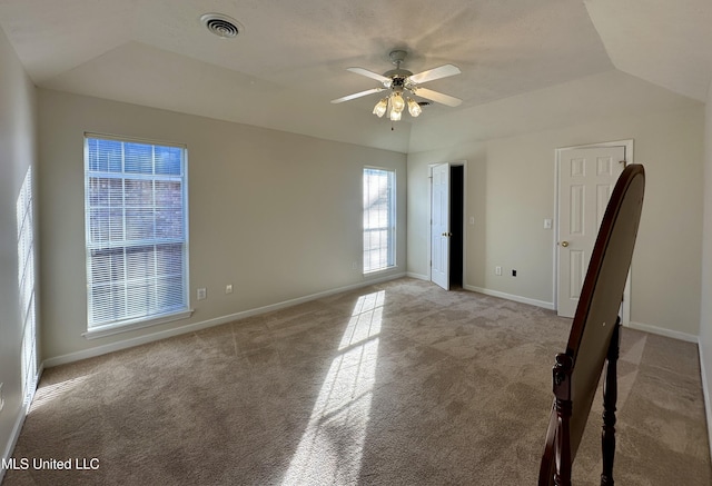 unfurnished room with ceiling fan, light carpet, and lofted ceiling