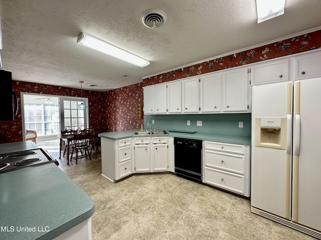 kitchen featuring pendant lighting, sink, white cabinetry, black dishwasher, and white fridge with ice dispenser