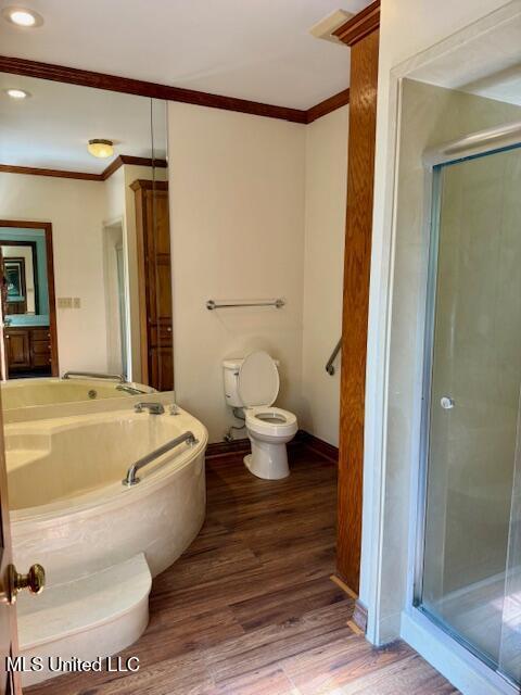 618 Gordon Pl Unit 618, Madison, MS 39110 - full bath featuring toilet, wood finished floors, a garden tub, a shower stall, and ornamental molding