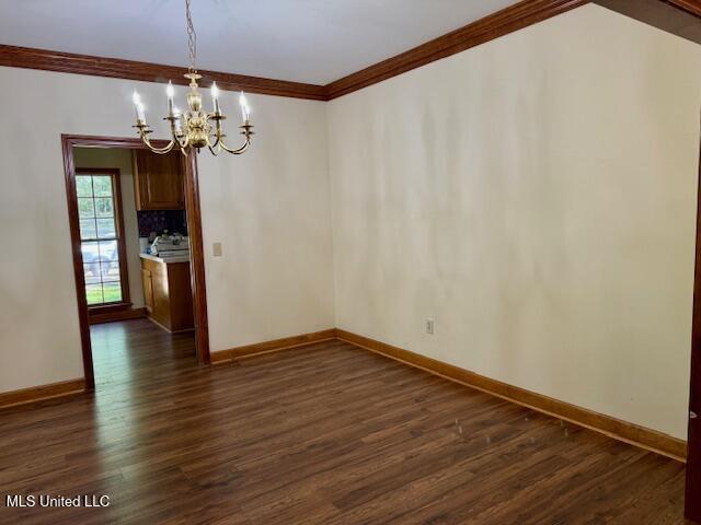 618 Gordon Pl Unit 618, Madison, MS 39110 - unfurnished room featuring a chandelier, dark wood finished floors, baseboards, and ornamental molding