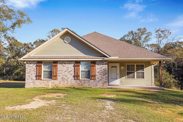 view of front of property with a porch and a front yard