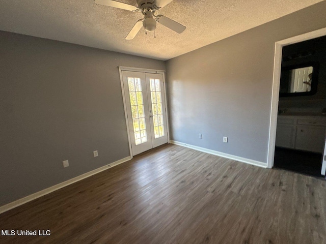 540 Woodland Hills Pl, Jackson, MS 39216 - empty room featuring a ceiling fan, a textured ceiling, french doors, baseboards, and dark wood-style flooring