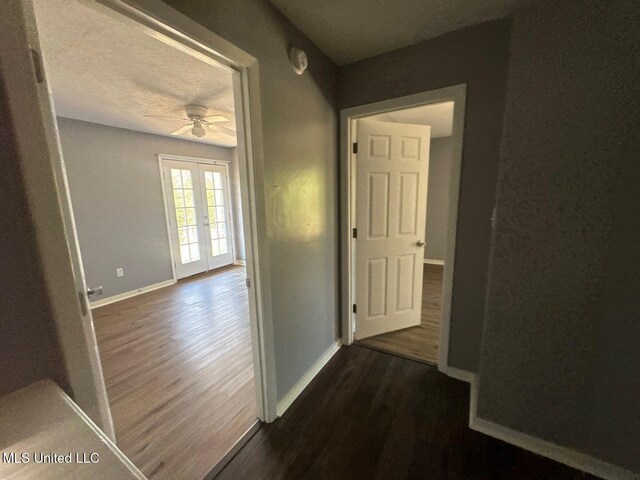 540 Woodland Hills Pl, Jackson, MS 39216 - corridor featuring baseboards, dark wood-style flooring, and french doors