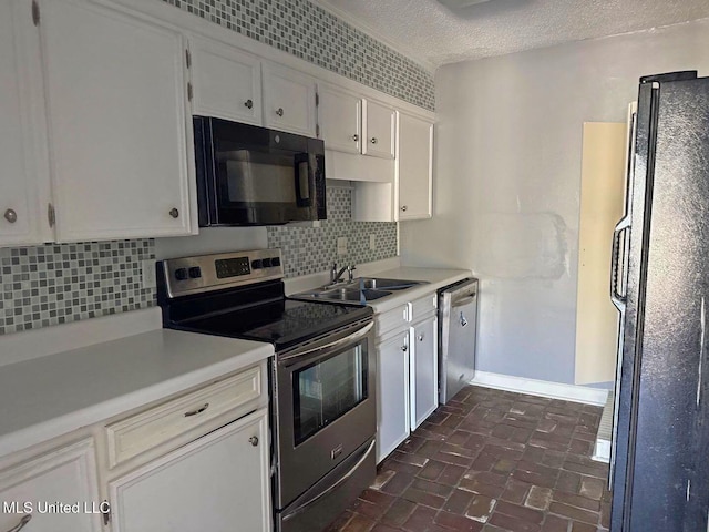 540 Woodland Hills Pl, Jackson, MS 39216 - kitchen featuring white cabinets, black appliances, light countertops, and baseboards