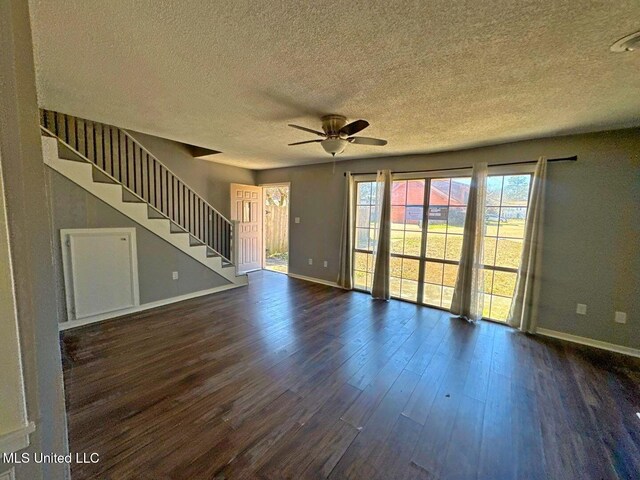 540 Woodland Hills Pl, Jackson, MS 39216 - unfurnished living room featuring stairway, a ceiling fan, dark wood-style flooring, and baseboards