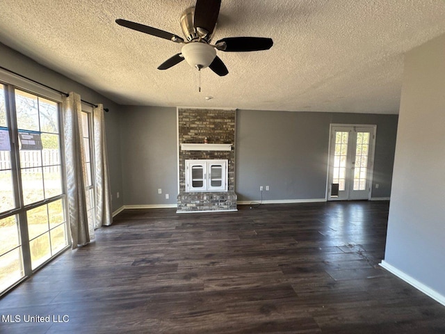 540 Woodland Hills Pl, Jackson, MS 39216 - unfurnished living room featuring dark wood finished floors, plenty of natural light, baseboards, and ceiling fan