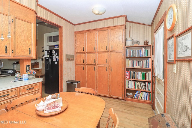 2548 Furrs Mill Dr, Wesson, MS 39191 - dining space with crown molding, wallpapered walls, and light wood finished floors