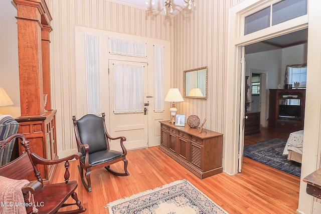 2548 Furrs Mill Dr, Wesson, MS 39191 - living area featuring light wood-style flooring and a chandelier