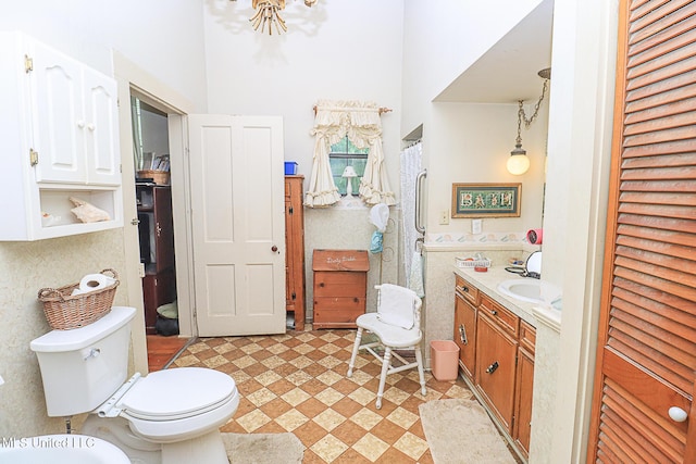 2548 Furrs Mill Dr, Wesson, MS 39191 - full bath with vanity, toilet, a high ceiling, and a shower