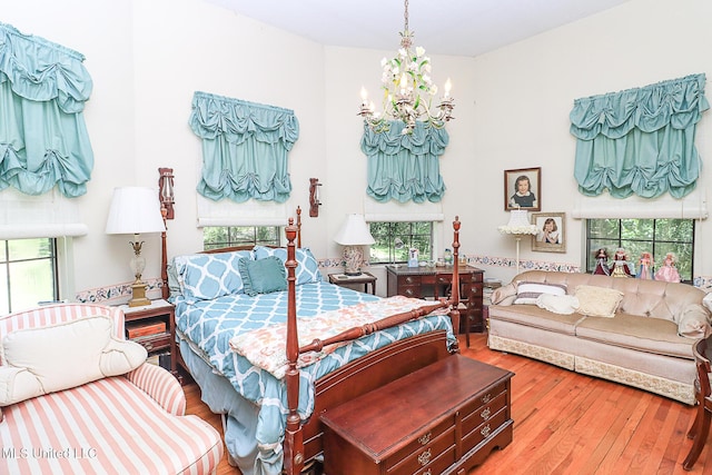 2548 Furrs Mill Dr, Wesson, MS 39191 - bedroom with a chandelier and hardwood / wood-style flooring