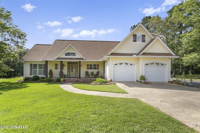 355 Louise Ln, Brandon, MS 39042 - traditional-style house with covered porch, concrete driveway, a front lawn, a shingled roof, and a garage