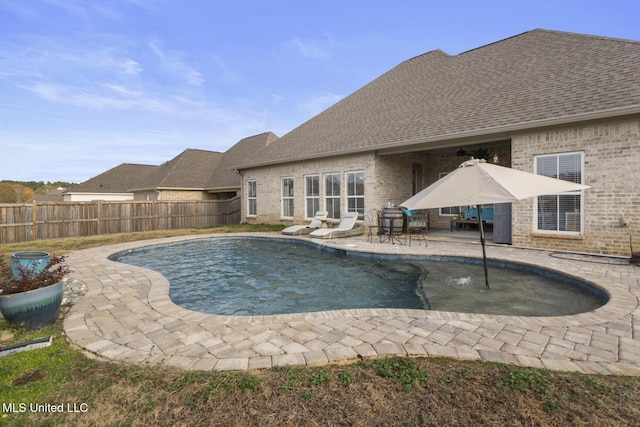 view of pool featuring a patio