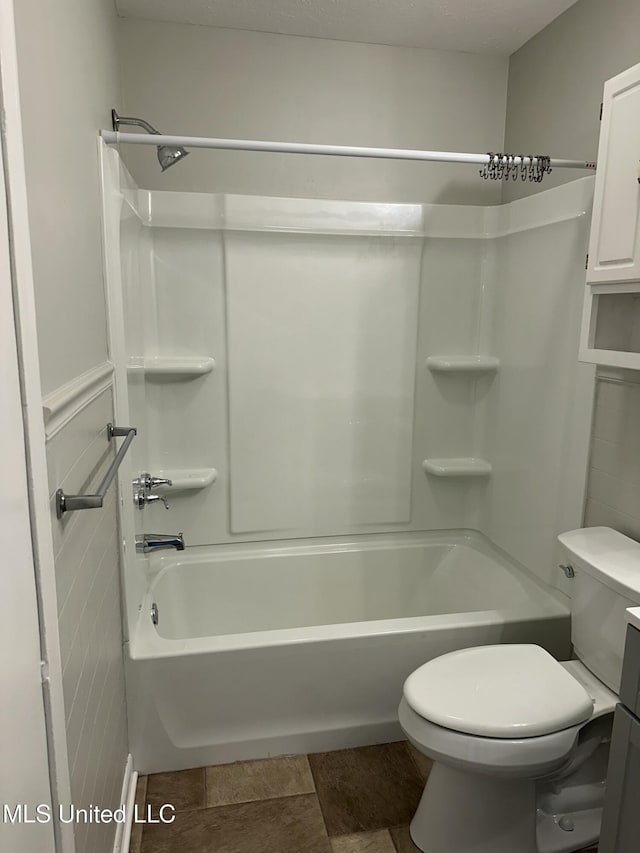 full bathroom with vanity, tub / shower combination, and toilet