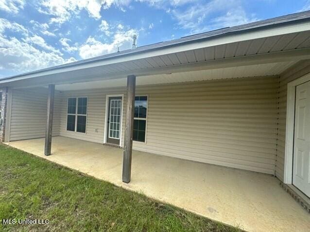 back of house featuring a patio area