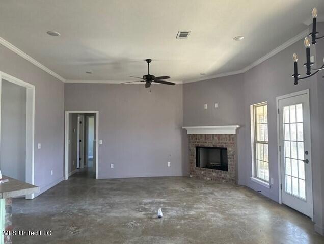 unfurnished living room featuring visible vents, a ceiling fan, concrete floors, and a brick fireplace