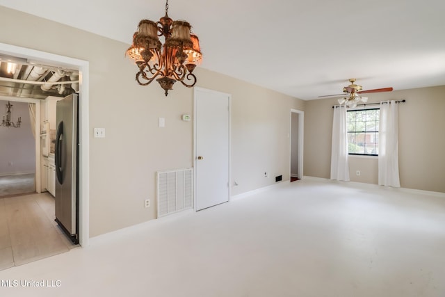 2512 Randall Dr, Biloxi, MS 39531 - empty room featuring a chandelier and ceiling fan