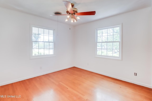 2512 Randall Dr, Biloxi, MS 39531 - empty room featuring light wood finished floors and ceiling fan