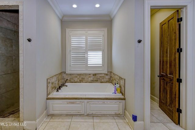 bathroom with tile patterned floors, ornamental molding, and a washtub