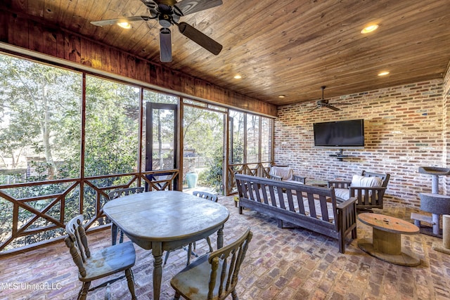 sunroom / solarium with wood ceiling and ceiling fan