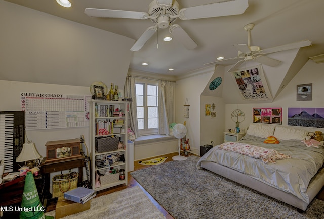 bedroom with ornamental molding and ceiling fan